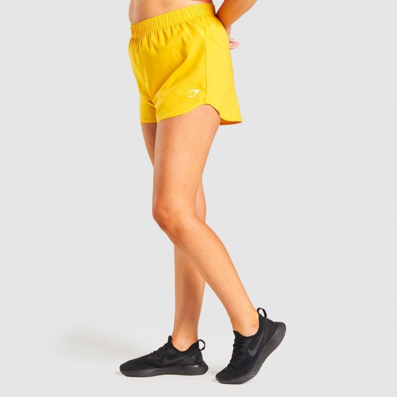 Short Gymshark Essential Loose Entrenamiento Amarillo | 04RDEXBYC