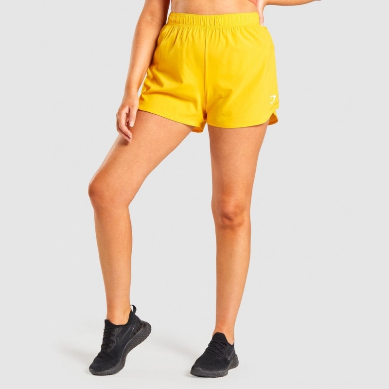 Short Gymshark Essential Loose Entrenamiento Amarillo | 04RDEXBYC